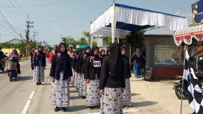 
					Regu 92 MTs Muhammadiyah 20 Menongo Tampil Kompak di Lomba Gerak Jalan HUT ke-81 RI